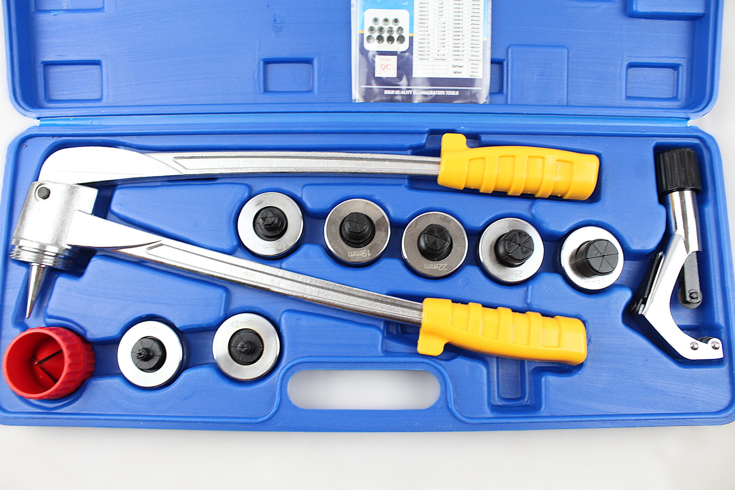A metal pipe bender tool kit with yellow handles, various metal mandrels, a red pipe cleaner, and a black-handled lever, all arranged inside an open blue plastic storage case on a white background.