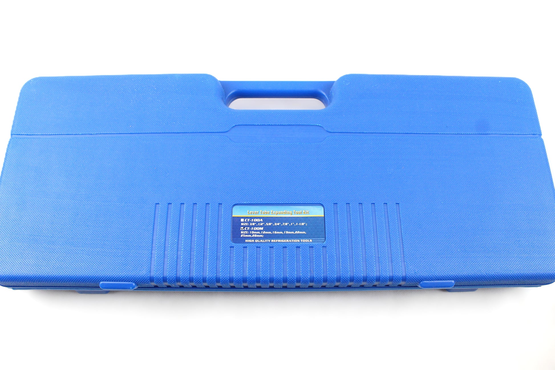A blue plastic tool case with a molded handle and a small label on the front, photographed on a plain white background.